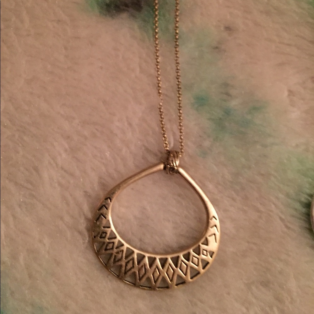 The Sak open work pendant necklace